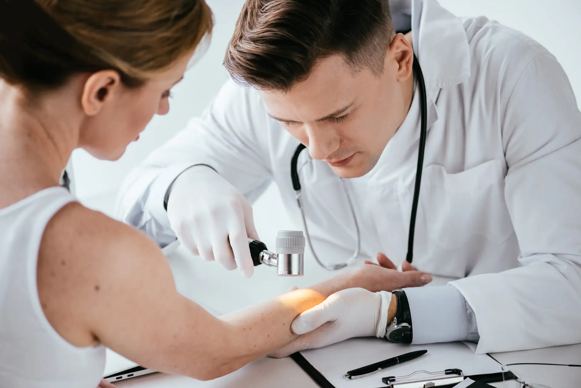 selective focus of dermatologist examining hand of 2024 11 17 20 13 09 utc scaled