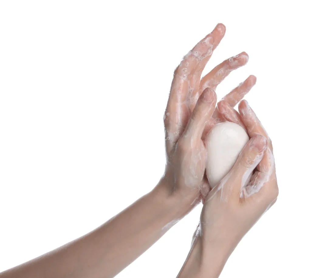Woman washing her hands thoroughly with soap