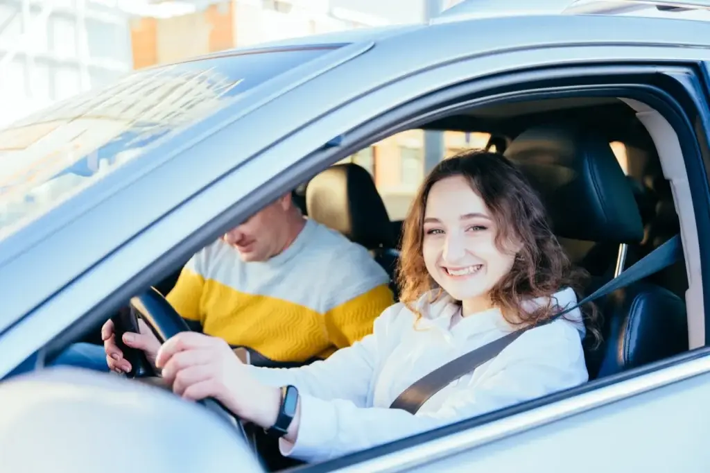Young driver behind the wheel during a driving lesson