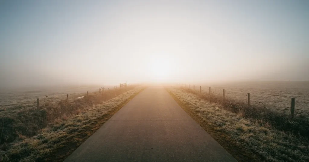 How Can You Manage Post-Acute Withdrawal Syndrome (PAWS)? 10 An open road stretching toward the horizon in morning light.